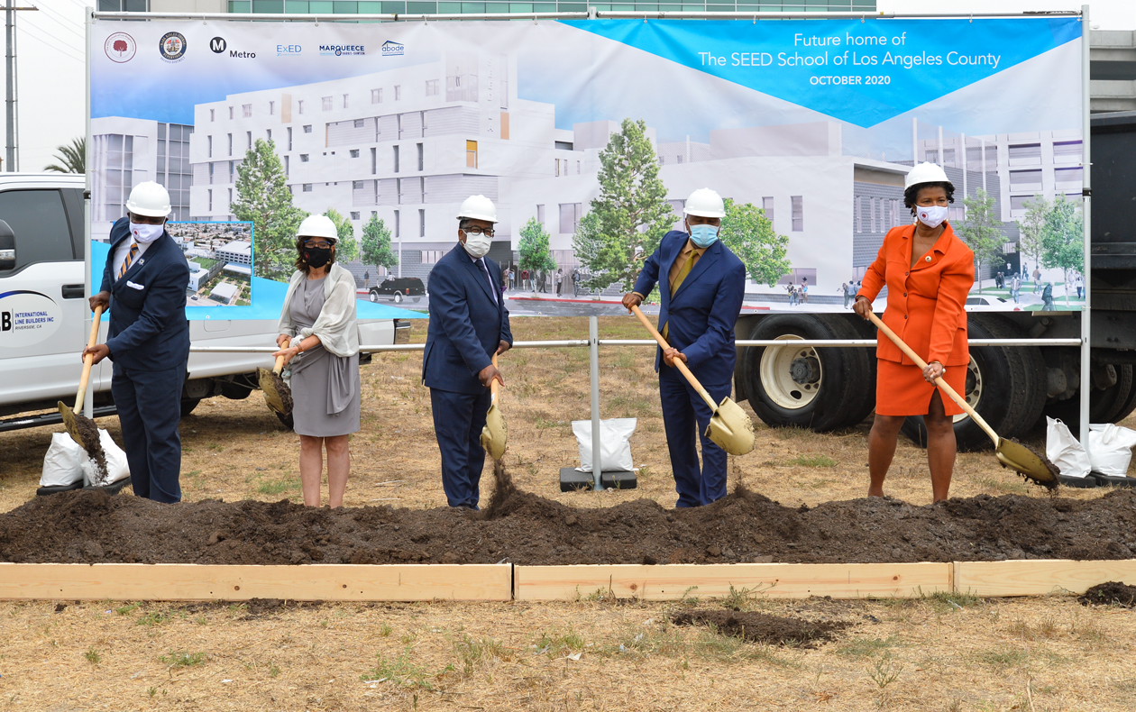 Officials shovel dirt for SEED School of Los Angeles Groundbreaking Ceremony.
