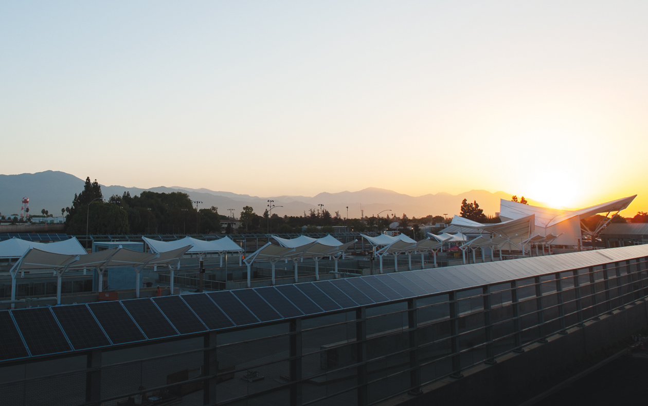 Photo of solar panels and shaded carports at a Metro facility.